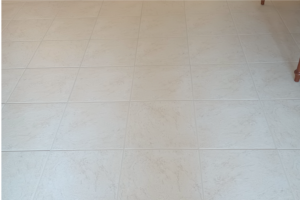 Clean tile floor with bright restored grout after professional cleaning in Port Charlotte Florida