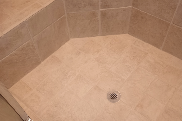 Clean shower tile and restored grout after professional cleaning in Port Charlotte Florida